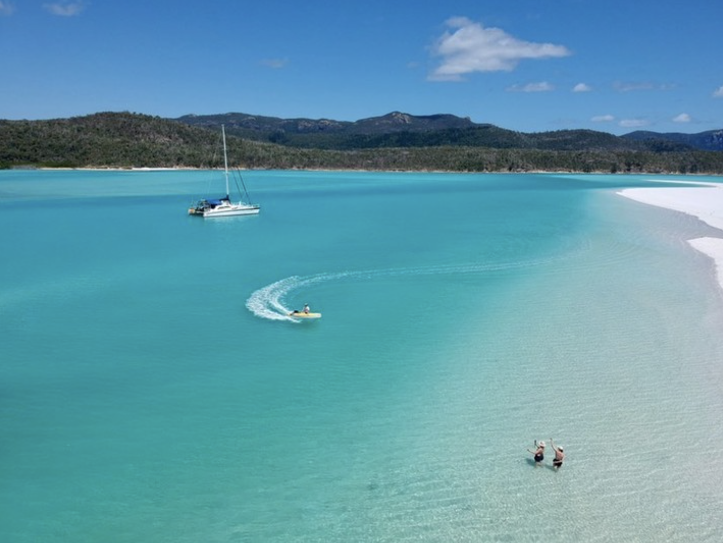 Catamaran anchored off Whitehaven Beach